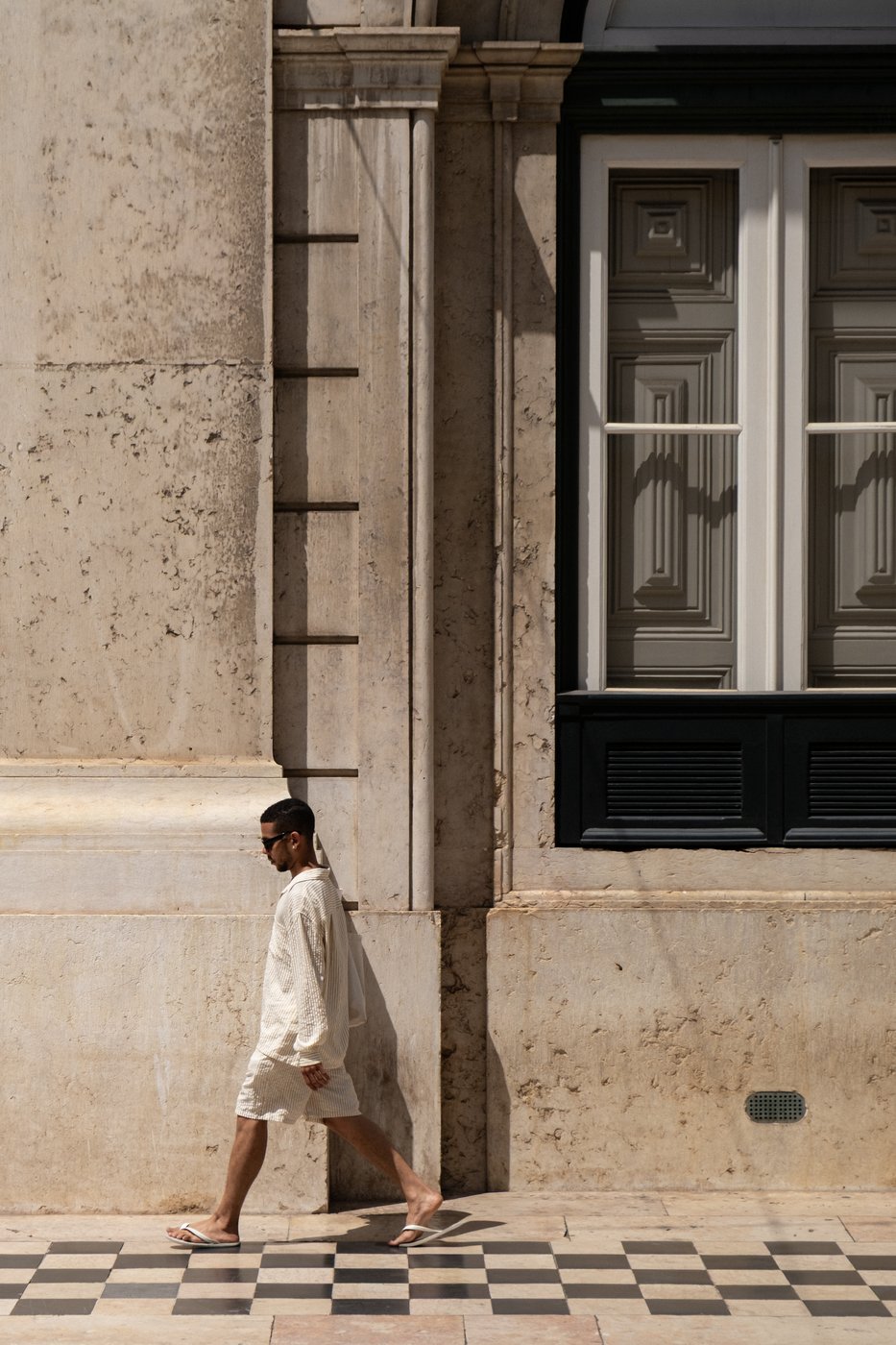 Linen, Lisbon, 2026, Rua do Arsenal, summer afternoon